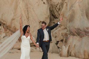 Bride laughing during candid wedding moment