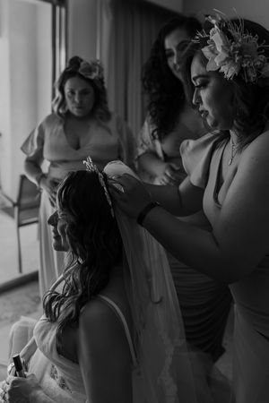 Bride getting ready with bridesmaids in Cabo