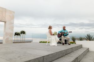 Wedding ceremony arch decorated with flowers in Cabo