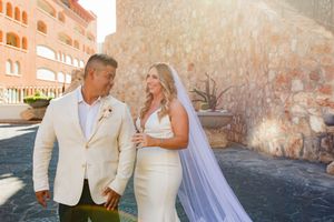 Bride looking at groom during ceremony in Cabo