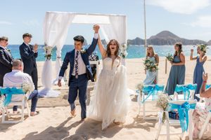 Wedding guests celebrating outdoor event in Los Cabos