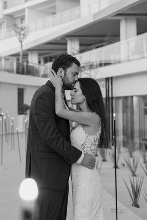 Romantic first dance under lights in Cabo reception