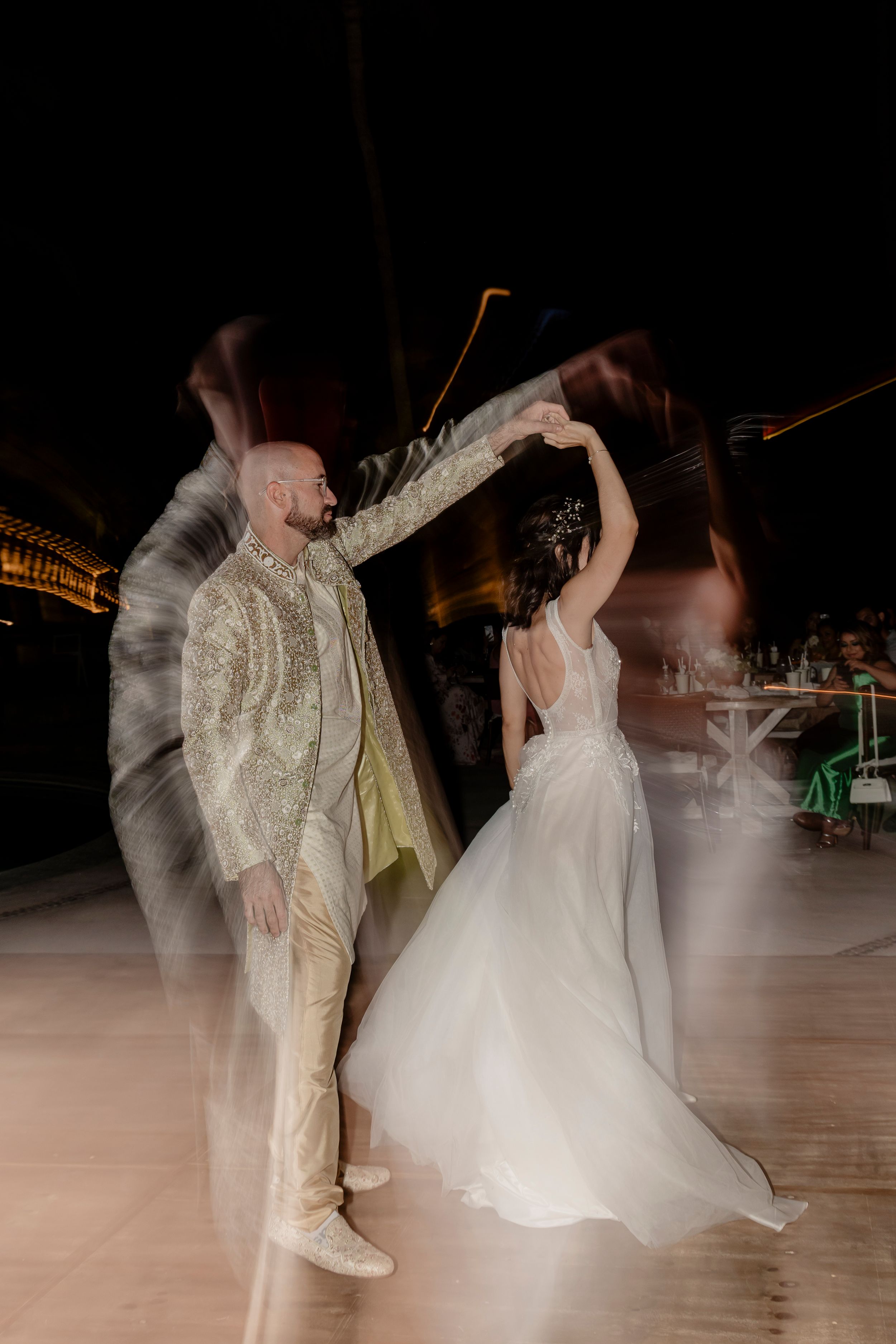 Romantic first dance under lights in Cabo reception