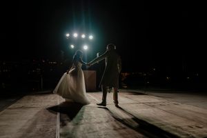 Newlyweds celebrating after ceremony in Los Cabos