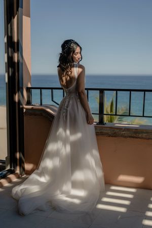 Bride walking down aisle at outdoor Cabo wedding