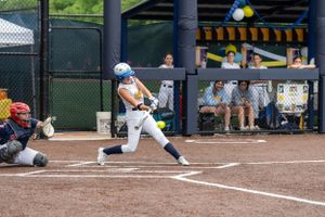 Wissahickon Highschool softball batter attempting a homerun