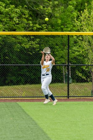 Wissahickon Highschool softball outfielder making a catch