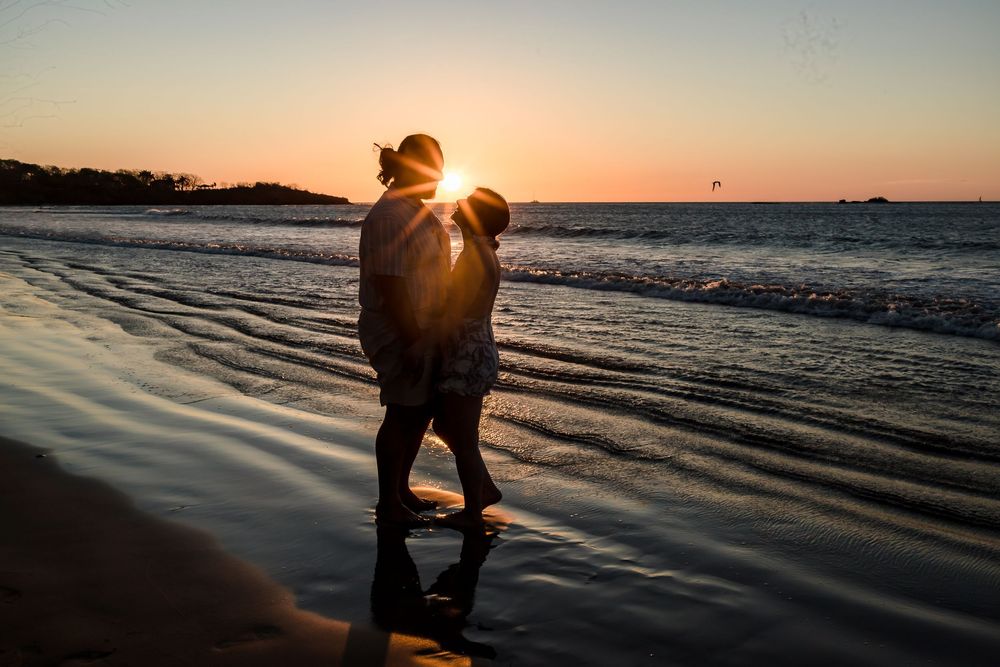 Tamarindo beach sunset surprise proposal photos