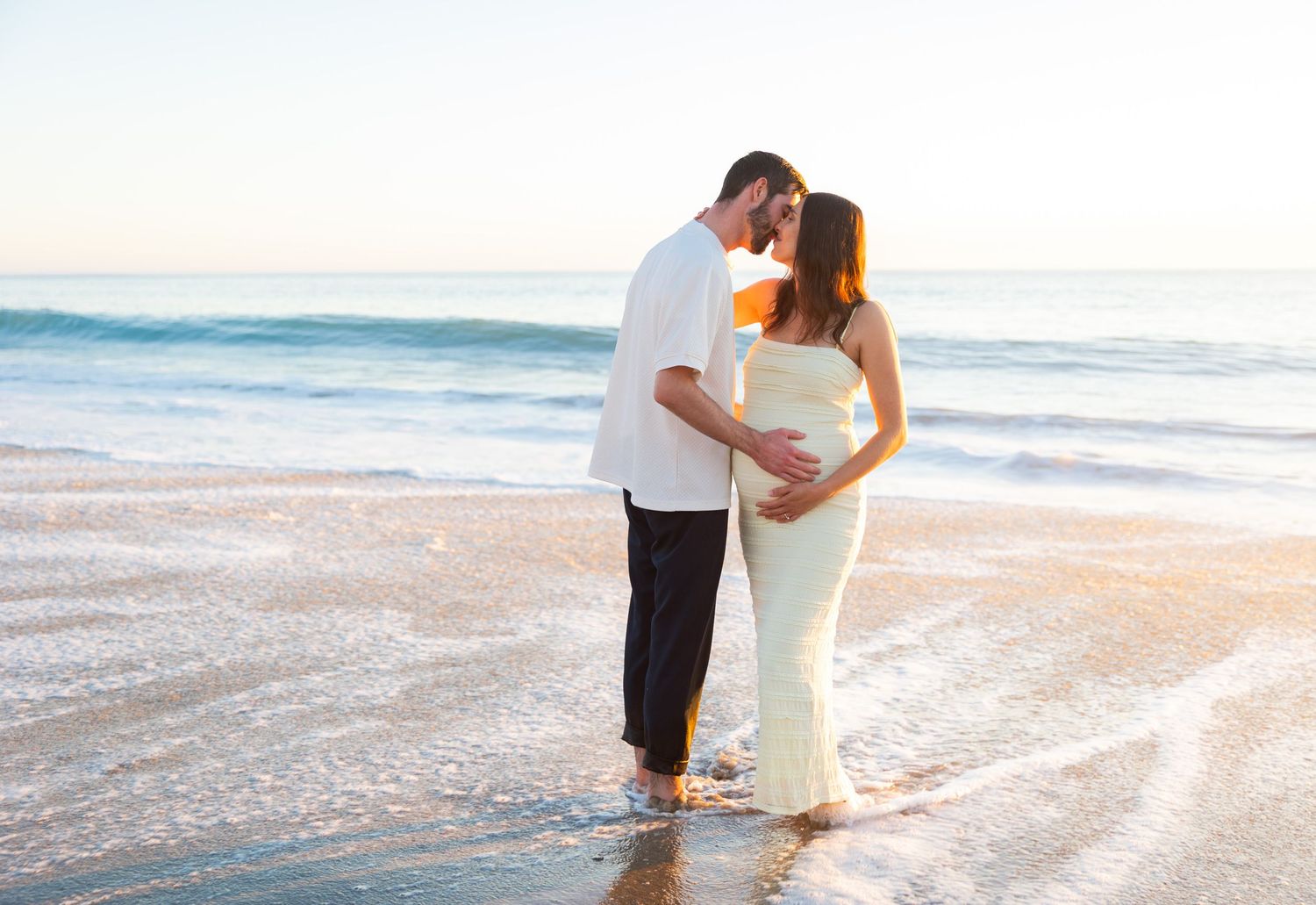 Maternity session at the beach during golden hour at San Clemente