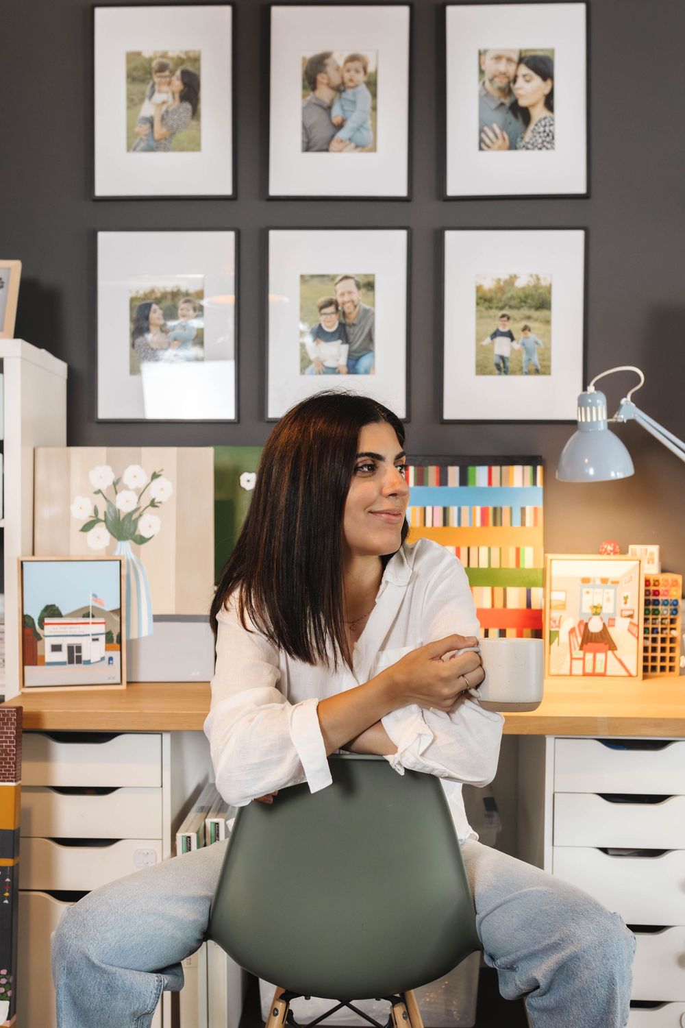 Woman sitting in chair with mug