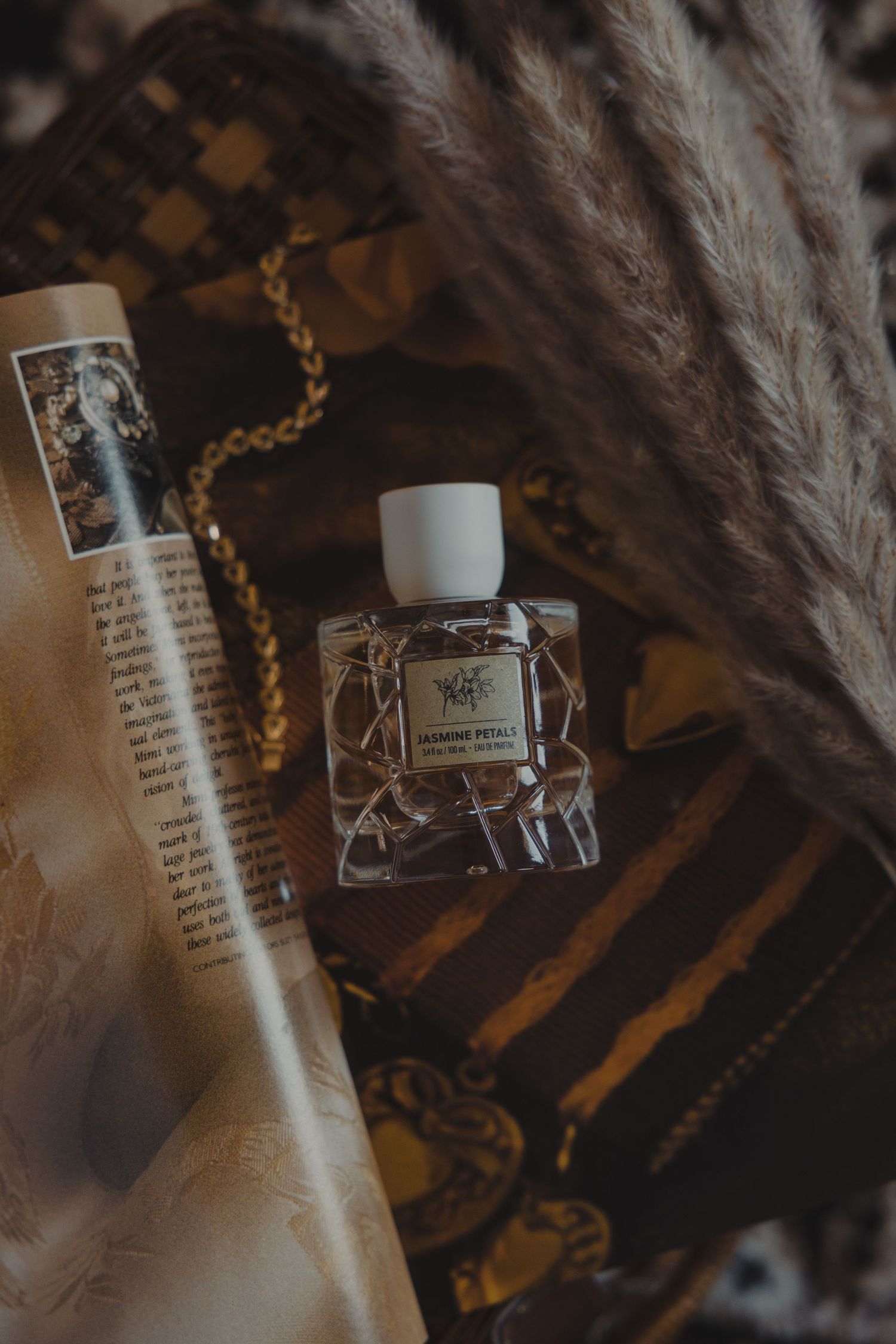 romantic, warm, classic, perfume, dark academia, vintage, dark, moody, product photography, lifestyle, still-life, cozy, soft, feminine,