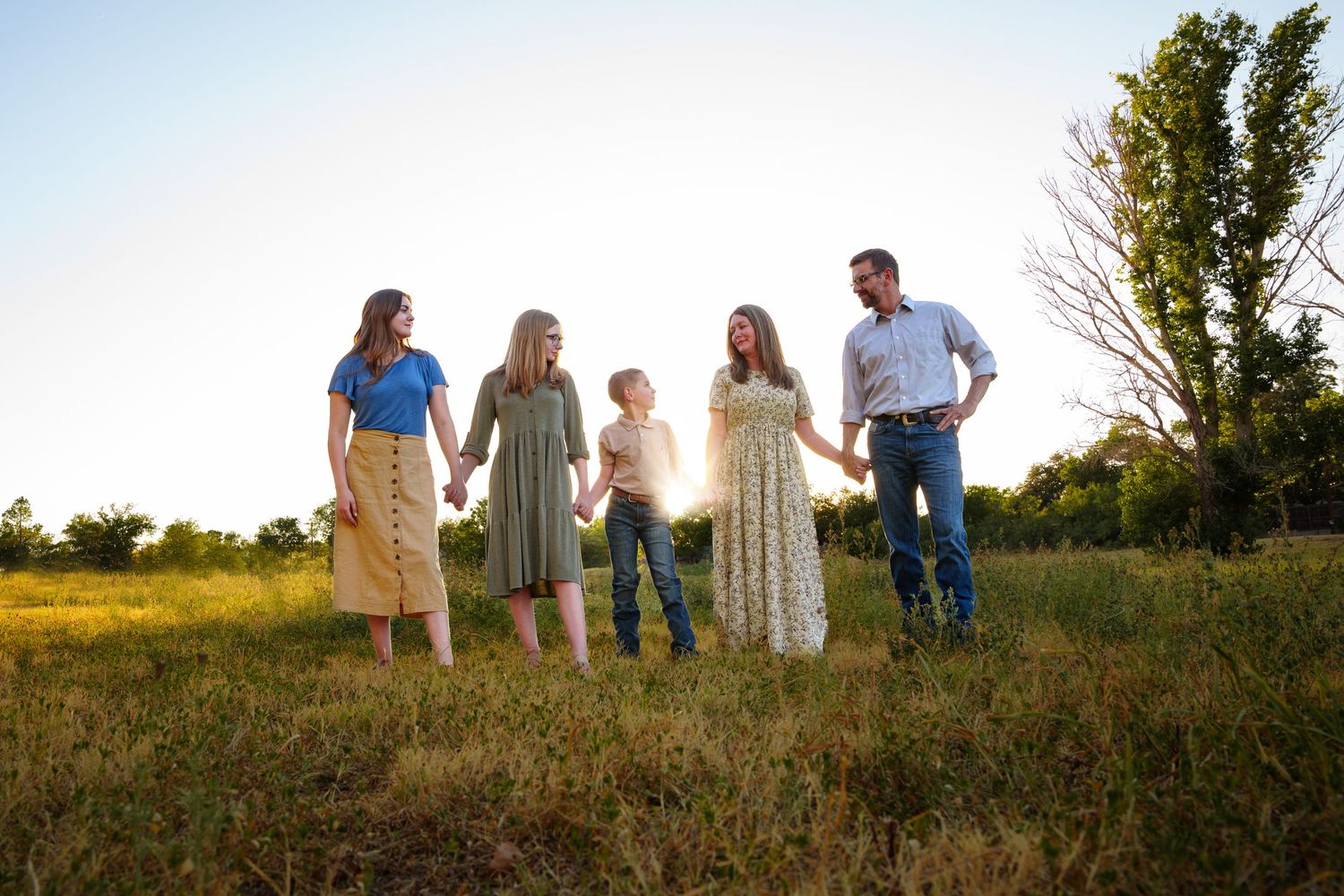 midland tx family photographer outdoor family session mom dad and children sunset family photo session midland tx