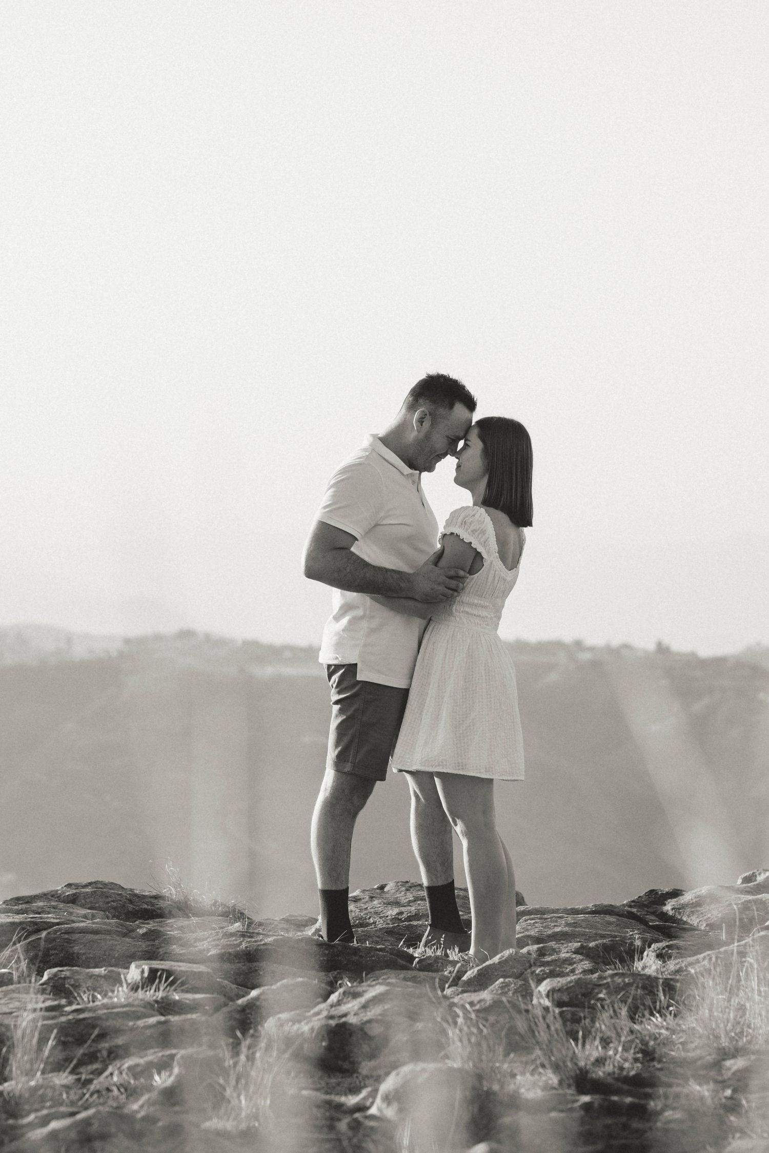 couple sitting on road