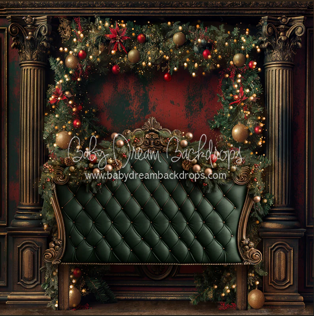 Elegant Victorian-style Christmas setting with tufted green couch and ornate gold details. Santa photographer