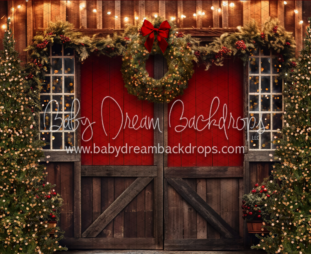 Rustic barn door backdrop with twinkling lights and Christmas wreaths. Santa photographer