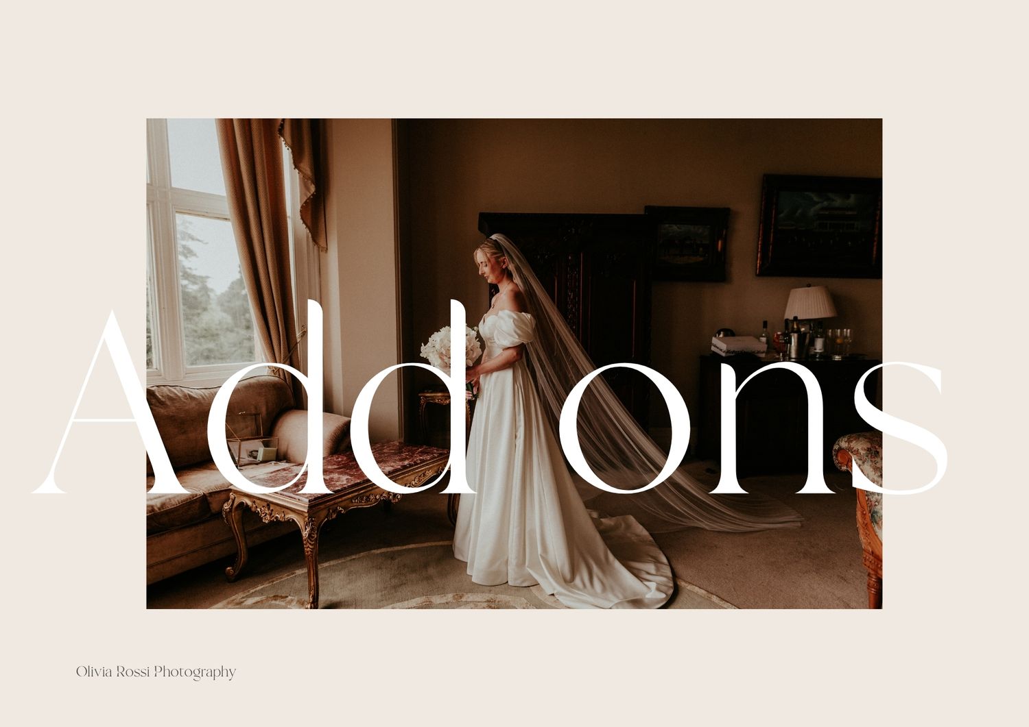 Elegant bride in flowing white gown and veil poses gracefully by window in rustic room with Addons text overlay.