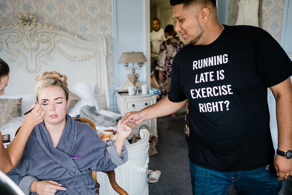 Wedding preparations with person wearing humorous running late workout t-shirt.
