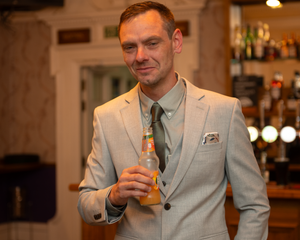 groom having a drink