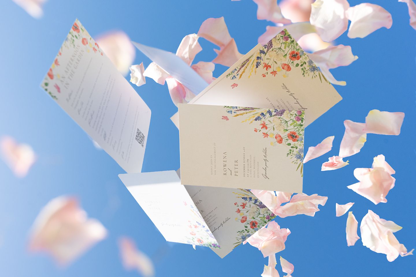 White paper documents scattered and floating against a bright blue sky background.