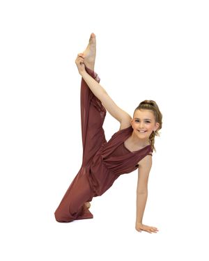 Dancer in burgundy costume demonstrates impressive flexibility in artistic pose.