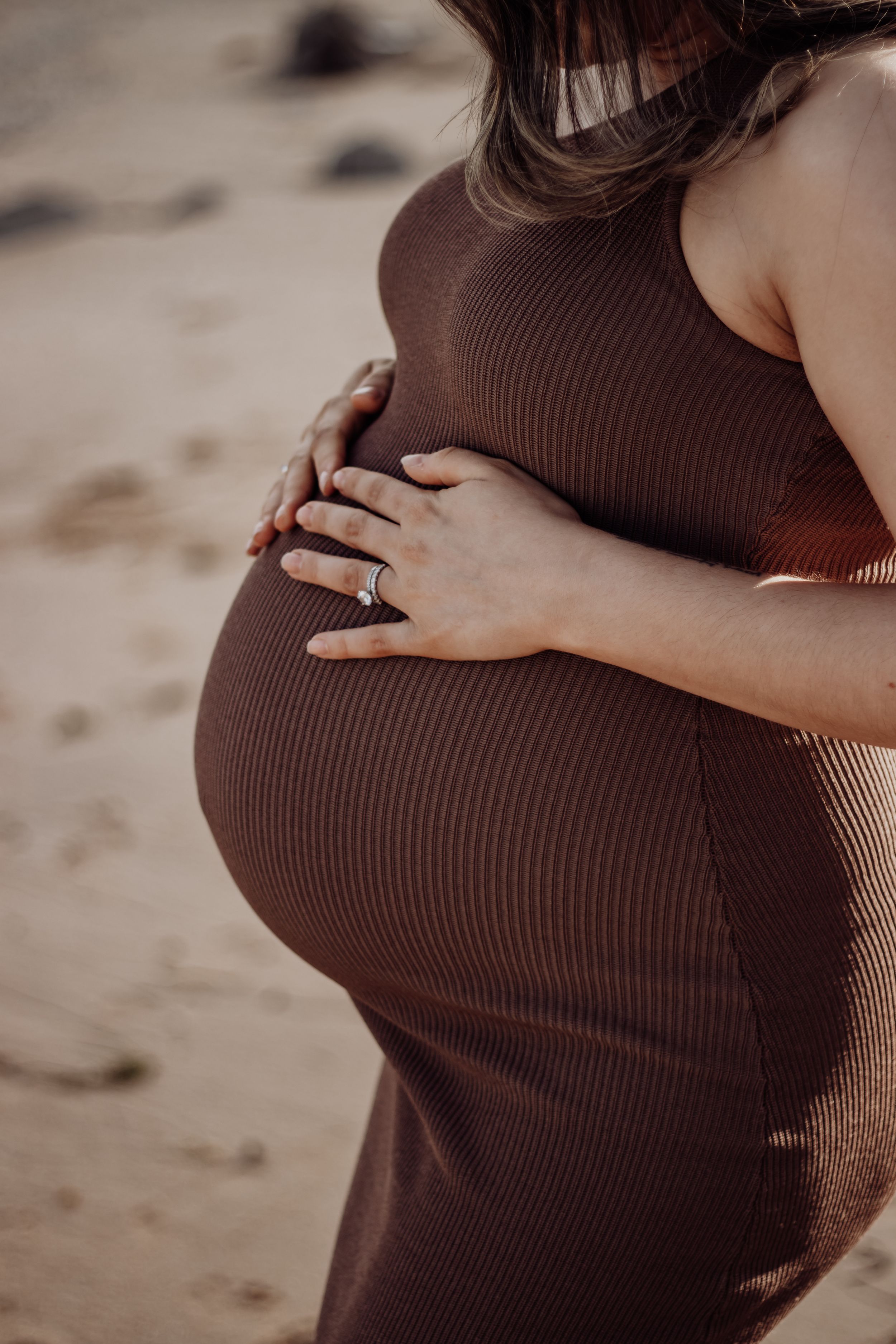 Close up of pregnant belly.