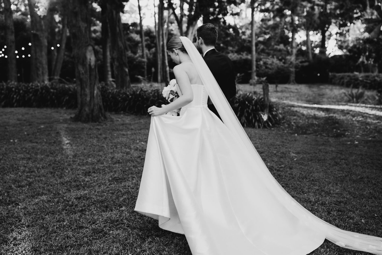 Series of romantic wedding photographs showing couple dancing in an outdoor garden setting.