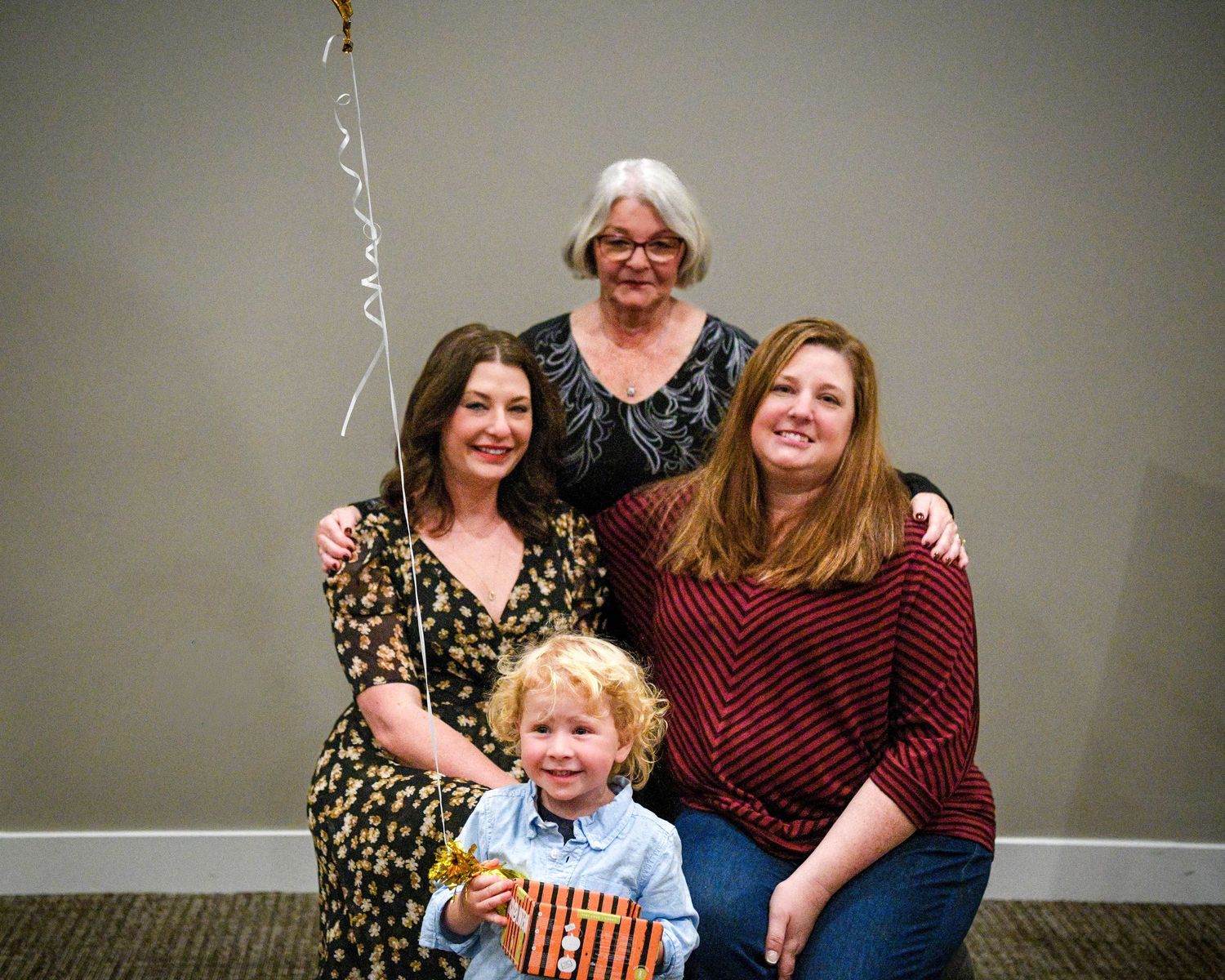 A series of candid family photos arranged in a horizontal collage showing joyful moments together.