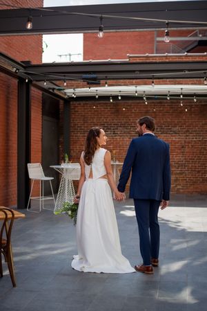 Bride and groom walking on wedding day