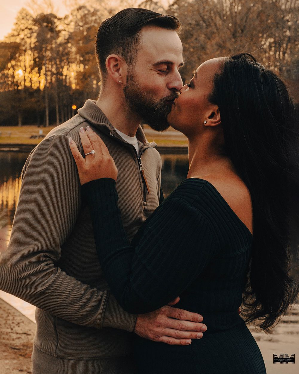 A couple shares intimate moments at sunset by a lake in a series of romantic photos.