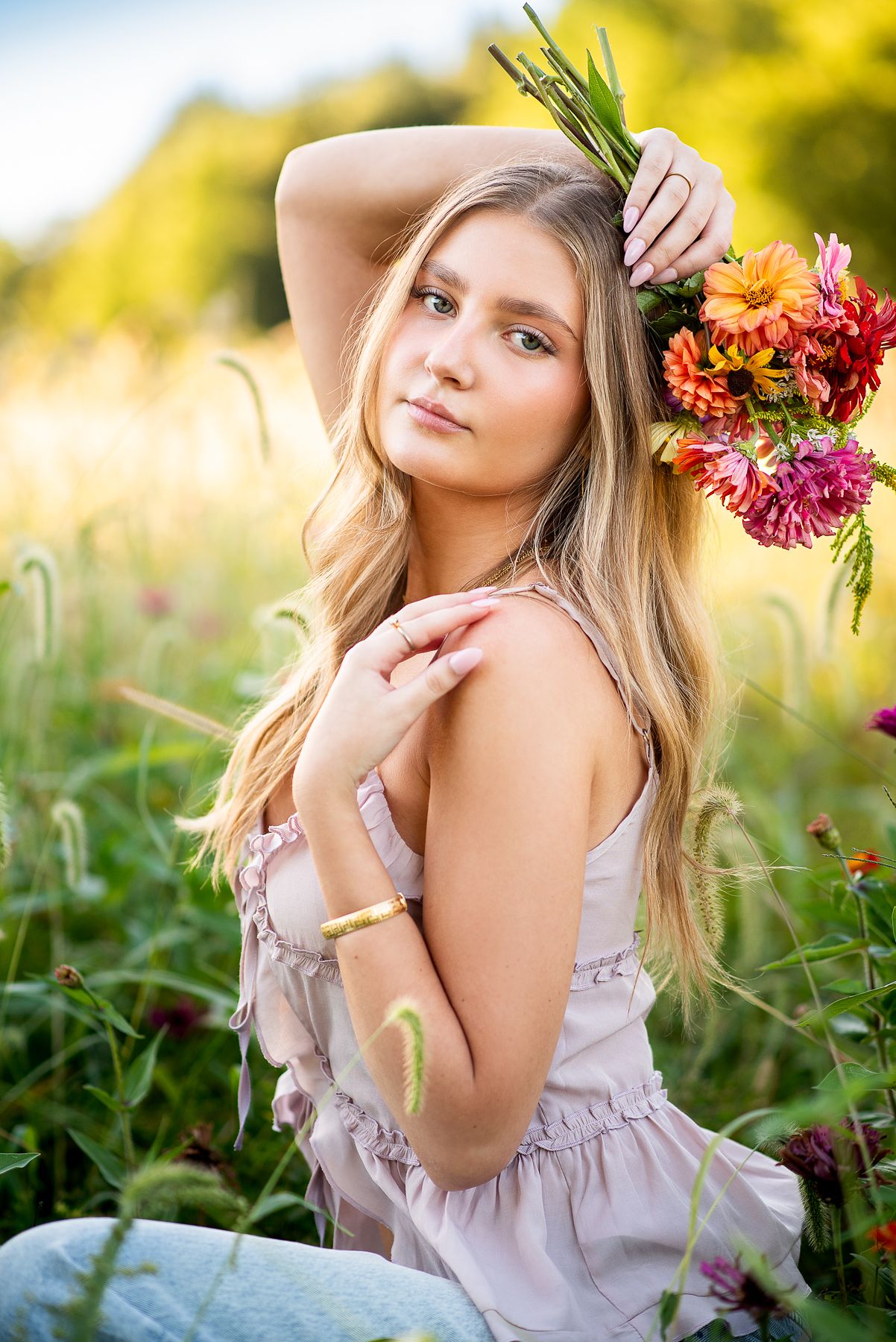 High school senior photographer Kansas City, Dreamy and colorful senior girl session in wildflower field in Harrisonville, Missouri