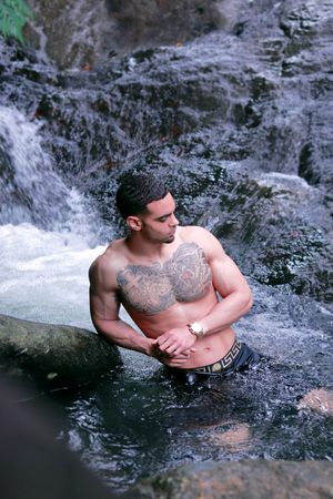 Puerto Rico Photographer. Albert Ray Photo. Rainforest Photoshoot. Male Portraits. Book Now. Waterfall Photoshoot. Male Shots. El Yunque.