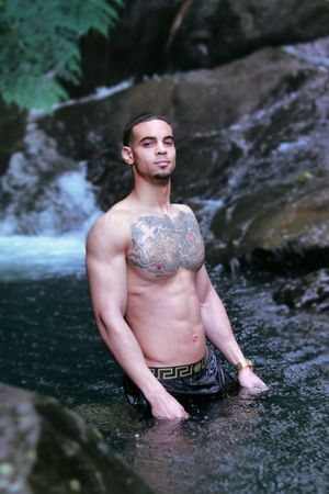 Puerto Rico Photographer. Albert Ray Photo. Rainforest Photoshoot. Male Portraits. Book Now. Waterfall Photoshoot. Male Shots. El Yunque.