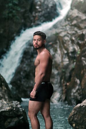 Puerto Rico Photographer. Albert Ray Photo. Rainforest Photoshoot. Male Portraits. Book Now. Waterfall Photoshoot. Male Shots. El Yunque.