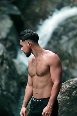 Puerto Rico Photographer. Albert Ray Photo. Rainforest Photoshoot. Male Portraits. Book Now. Waterfall Photoshoot. Male Shots. El Yunque.