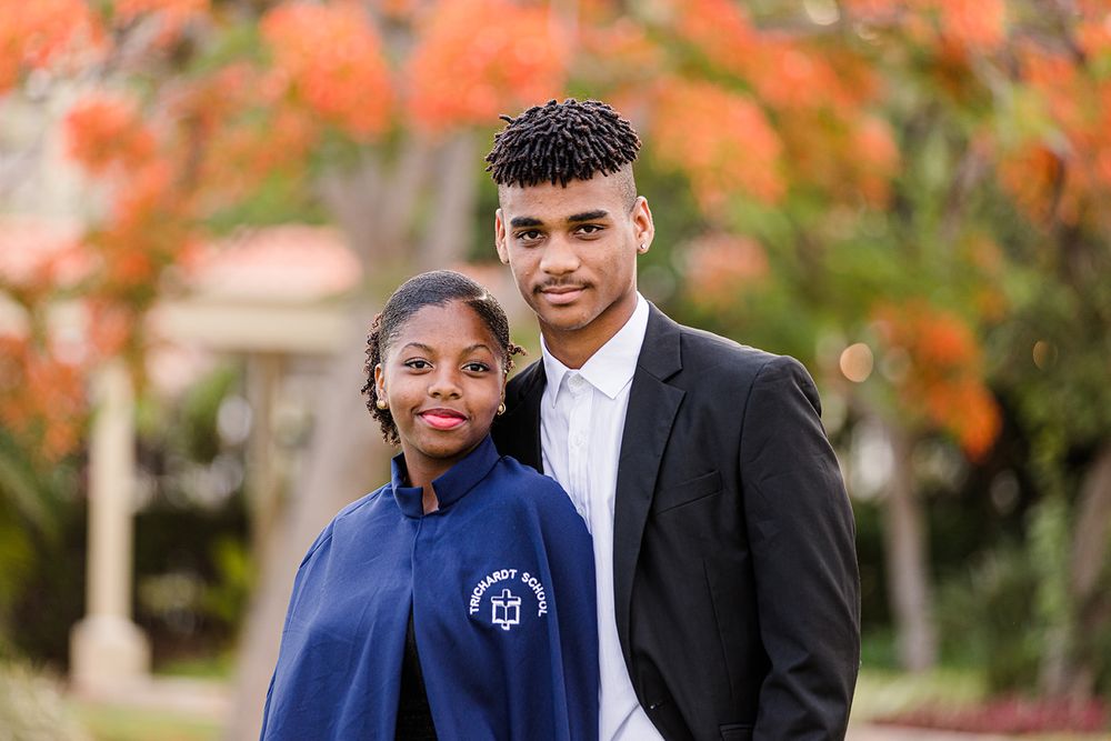 a graduation photo of a brother and sister in Maputo, Mozambique by mercy koimburi