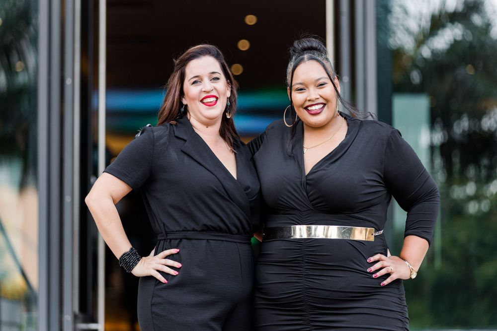 two ladies posing with big smiles at the Radisson Blu hotel maputo Mozambique