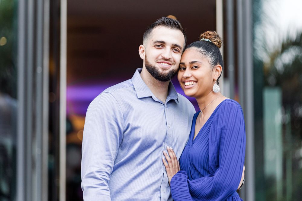 a couple posing with big smiles at the Radisson Blu hotel maputo Mozambique