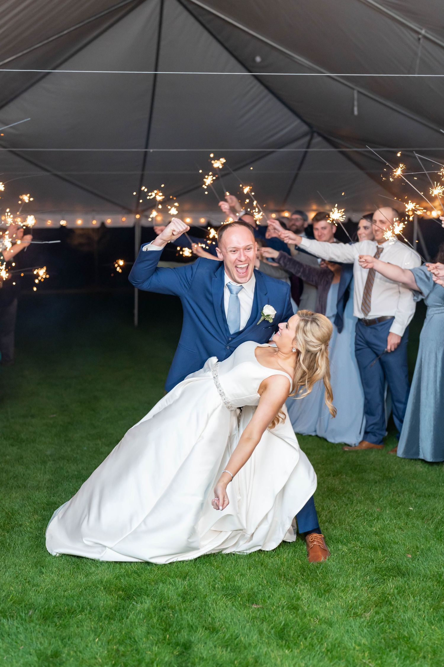 groom rejoices during dip while exiting