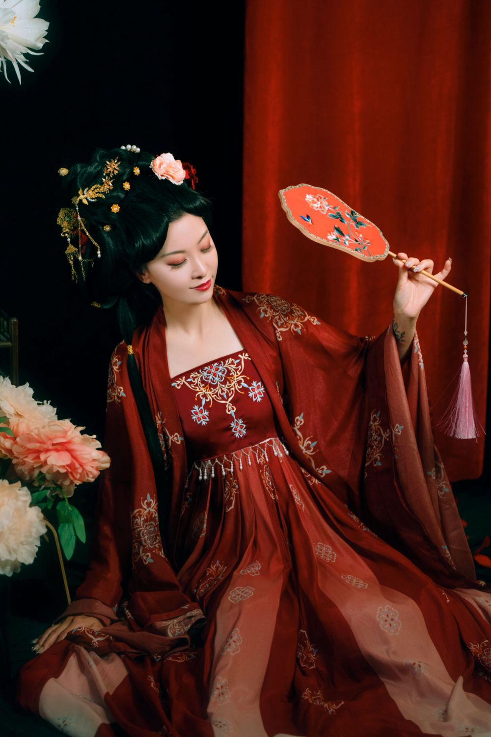 Elegant backlit studio portrait of mother and daughter in Tang Dynasty Hanfu on a swing among wisteria, by Imagine Image Studio.
