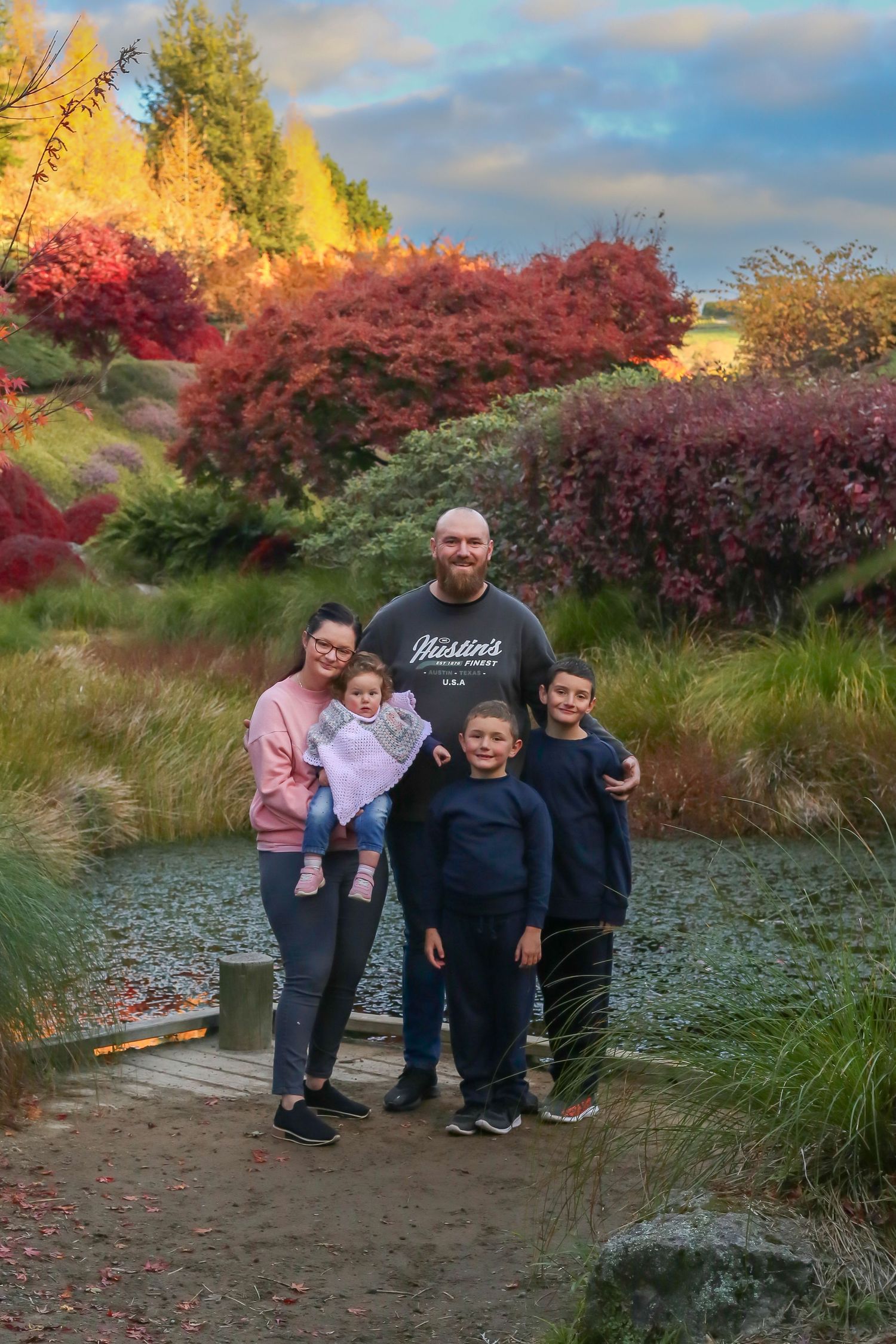 family photography inside the rotorua tree trust centennial park in rotorua