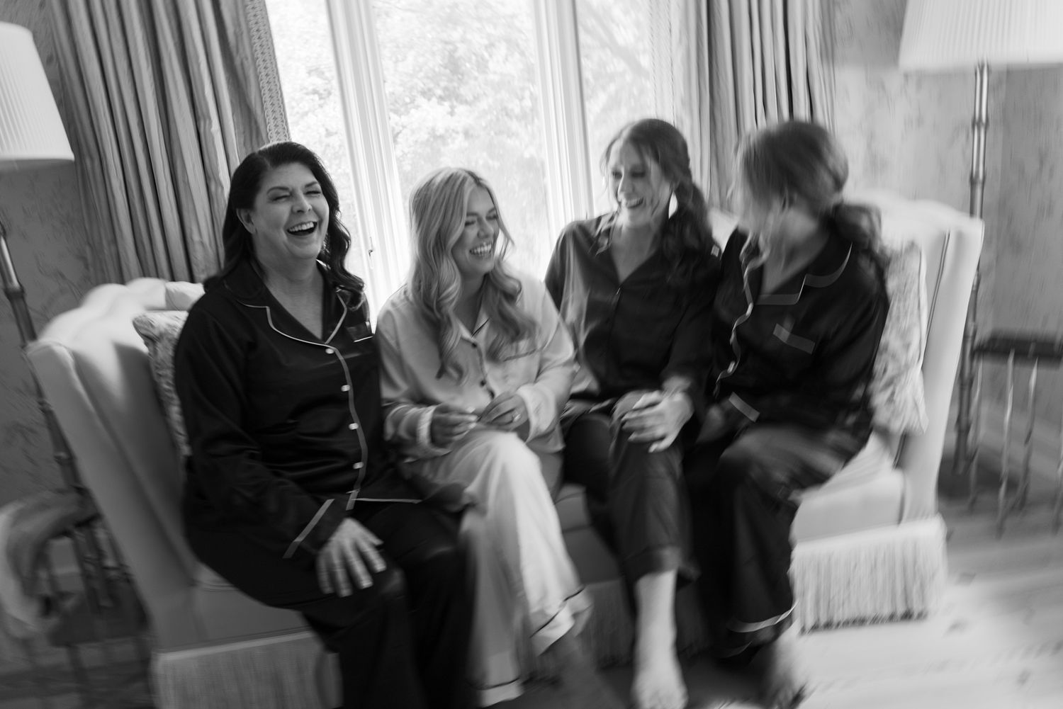 Group of friends in sleepwear lounging together in a casual setting.