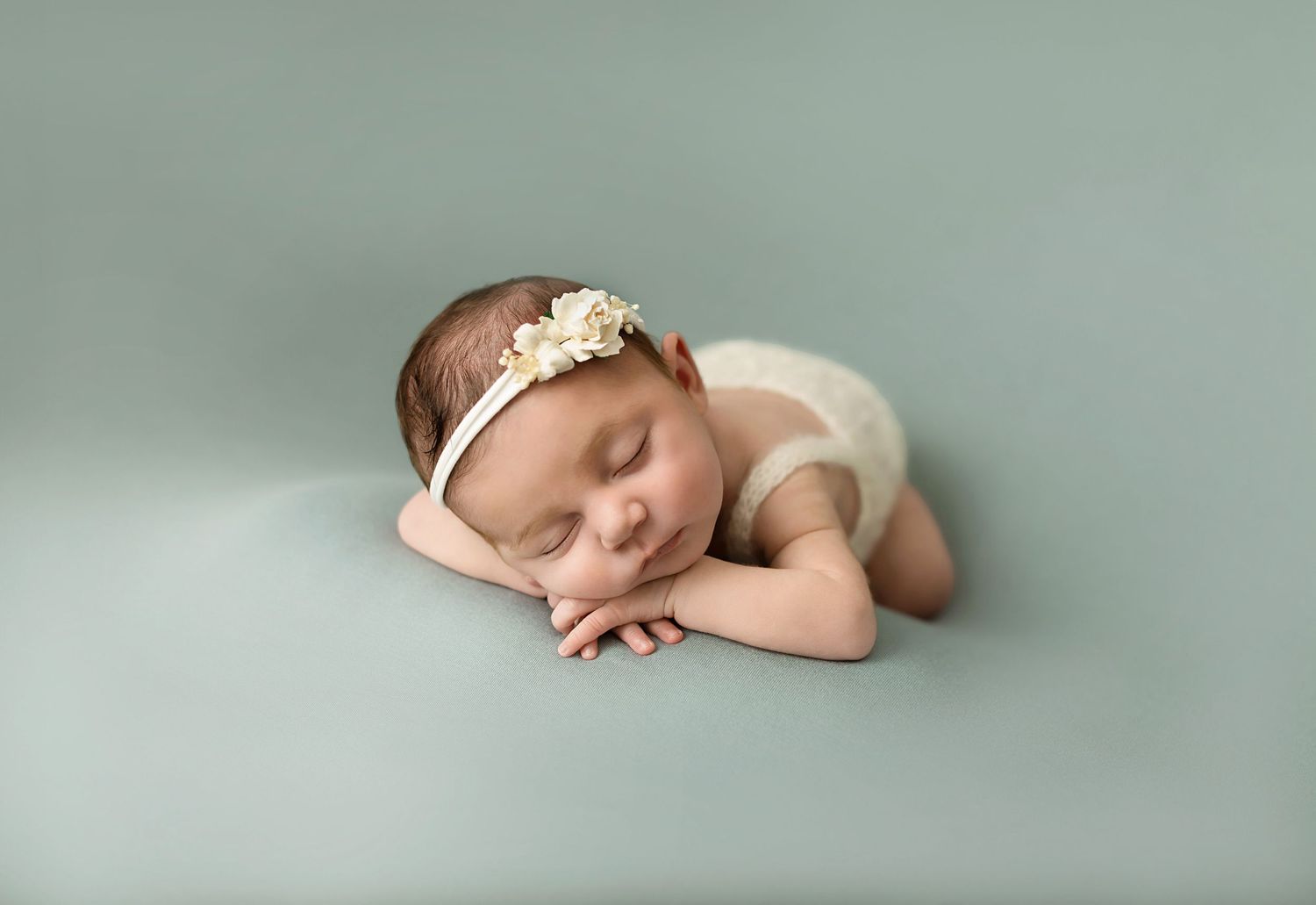 Image of posed newborn photography baby girl in Warwickshire