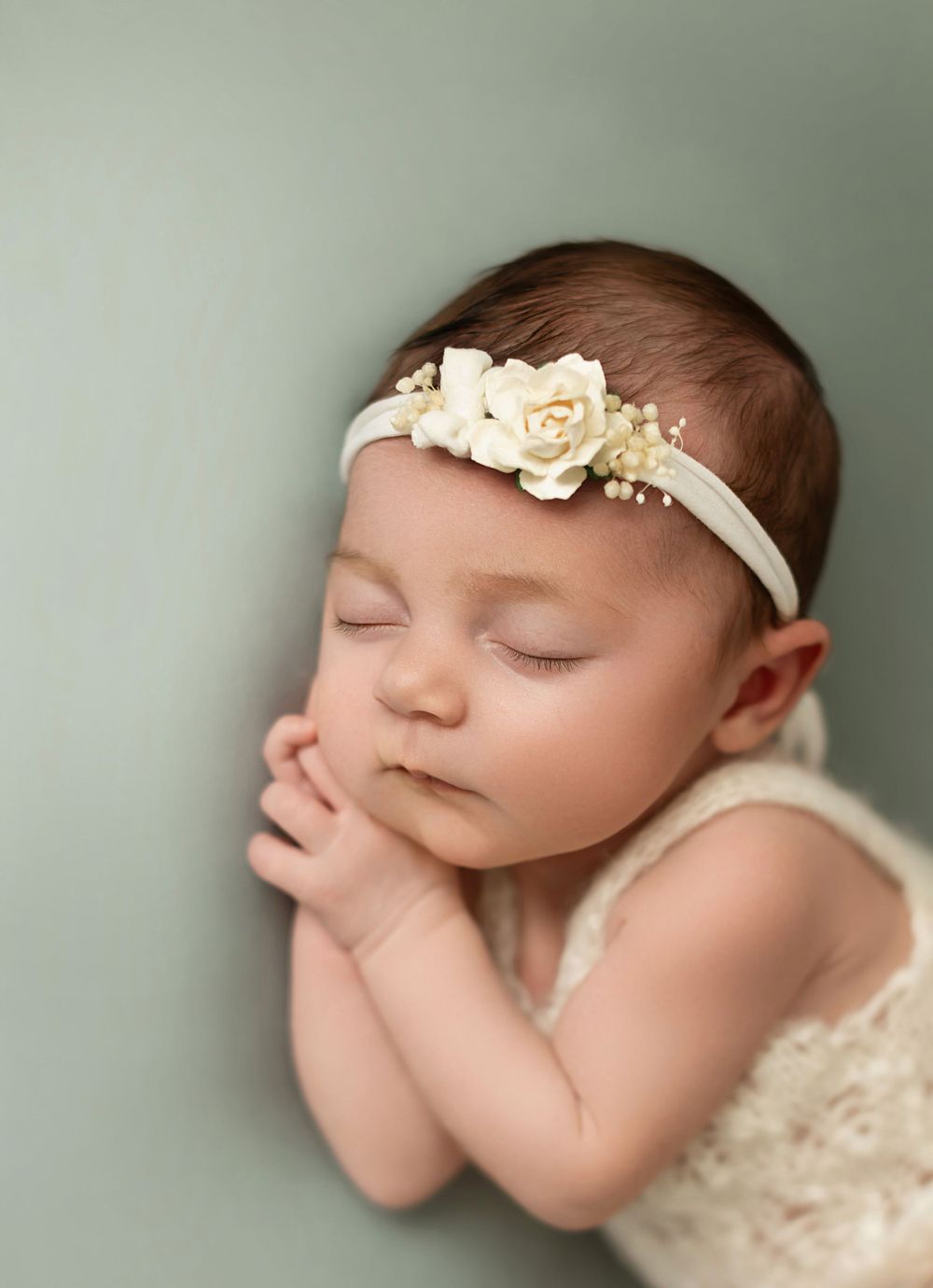 Image of posed newborn photography baby girl in Warwickshire.