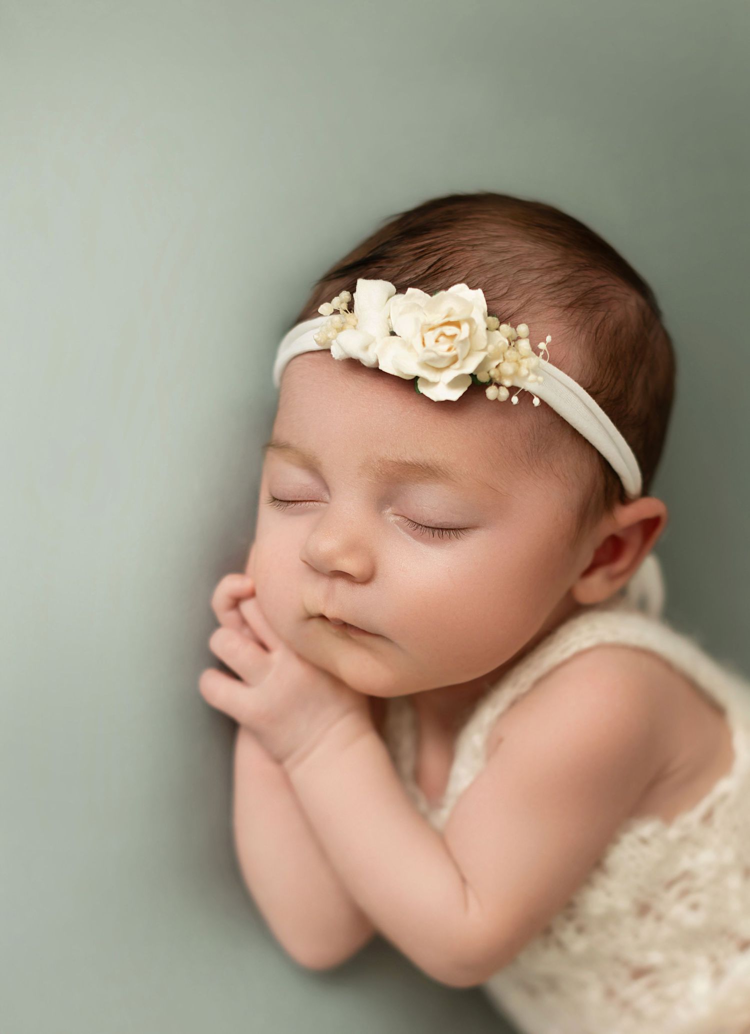 Image of posed newborn photography baby girl in Warwickshire.
