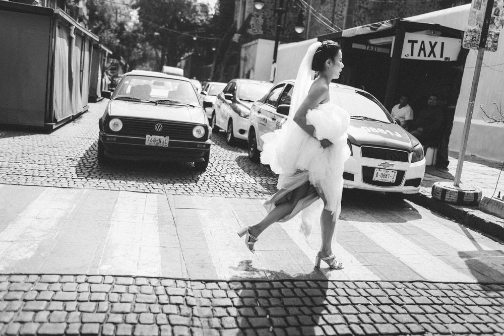 A series of black and white street photographs showing skateboarding tricks on urban sidewalks and steps.