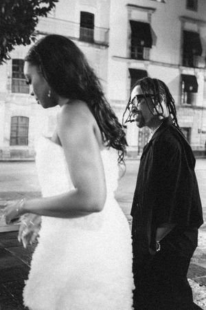 A black and white photo sequence shows two people dancing together in an intimate moment.