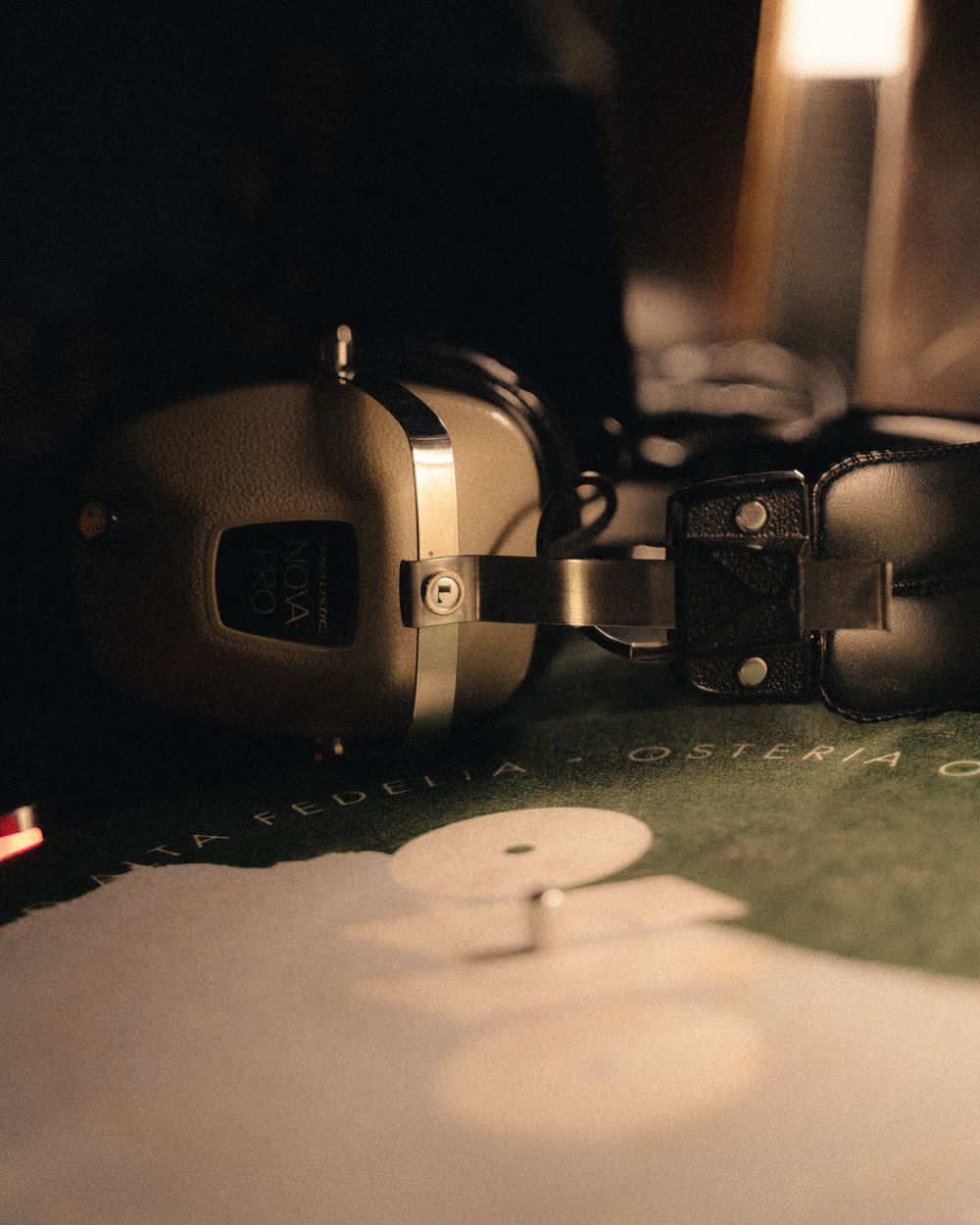 Vintage headphones resting on La Fedelia Osteria menu in moody dark setting.

Vancouver Canada Scene