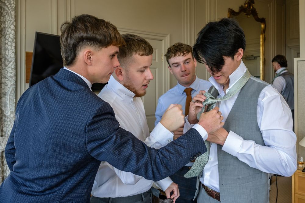 Groomsmen getting ready for Merewood Country House wedding