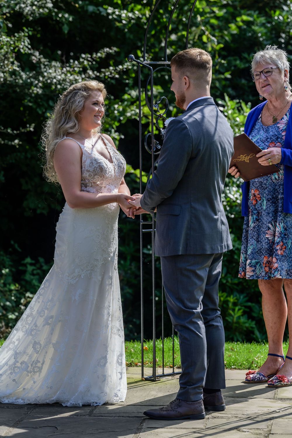 Bride and groom saying their vows at Merewood Country House wedding
