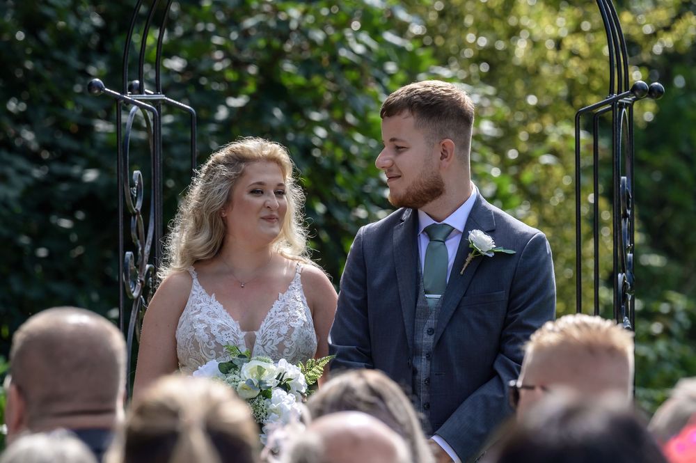 Bride and groom chatting after ceremony at Merewood Country House wedding